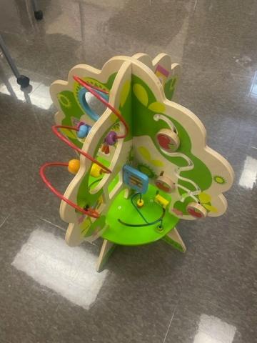 image of large wooden toy with sensory items