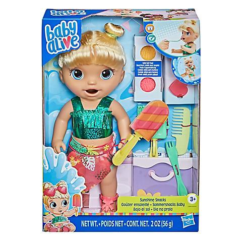 Blond Doll with a green tank top and a Hawaiian skirt with various accessories to play with 