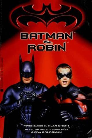 Batman and Robin in their superhero suits in fighting stances