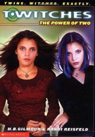 Two twin teenage girls, one with brunette hair wearing red, and the other with dyed blue streaks wearing black