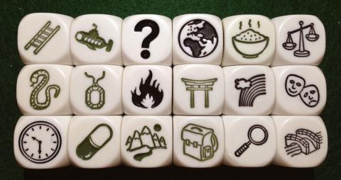 Some of the dice with various symbols that can be rolled