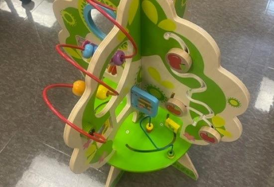 image of large wooden toy with sensory items