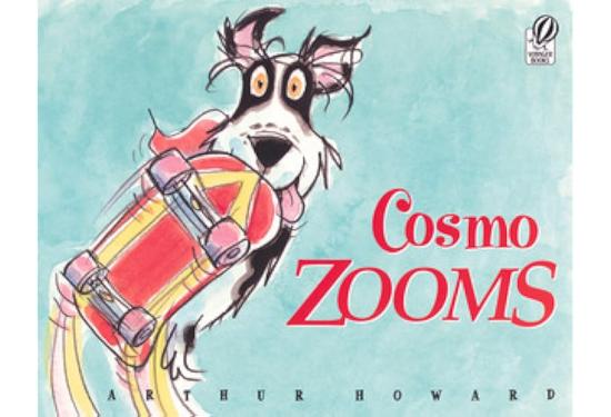 Cosmo the dog is on a skateboard