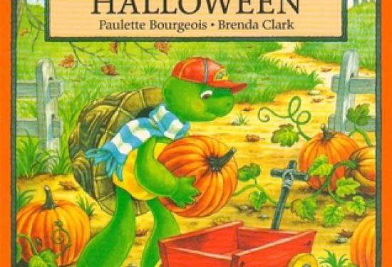 Franklin the turtle holding a pumpkin