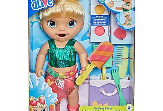 Blond Doll with a green tank top and a Hawaiian skirt with various accessories to play with 