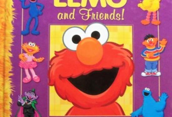 A purple cover with Elmo in the middle and various characters around him