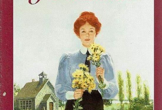 a young girl with red hair holding flowers in a field