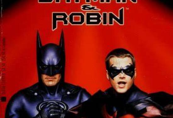 Batman and Robin in their superhero suits in fighting stances