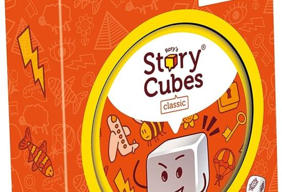 Front of the story cube box. Orange with animated dice on the front