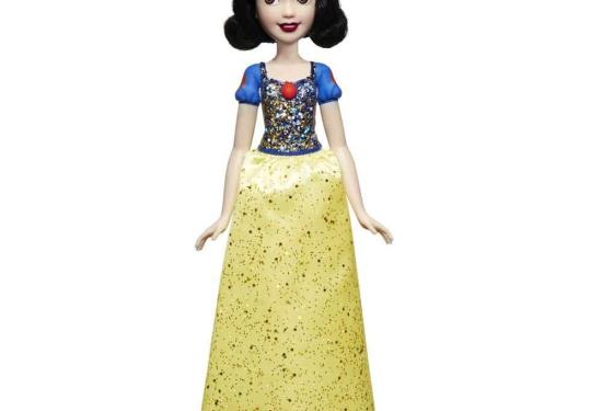 Snow white standing with her hands at her side with dress on and shimmering